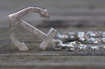 Anhänger Anker 140,-€ an Silberkette 79,-€ 